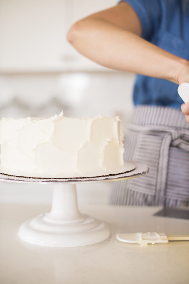 Cake by Courtney - Chocolate Lemon Zucchini Cake #chocolatecake #chocolatezucchinicake #lemoncreamcheesefrosting #chocolatelemonzucchinicake Cake on a turntable.