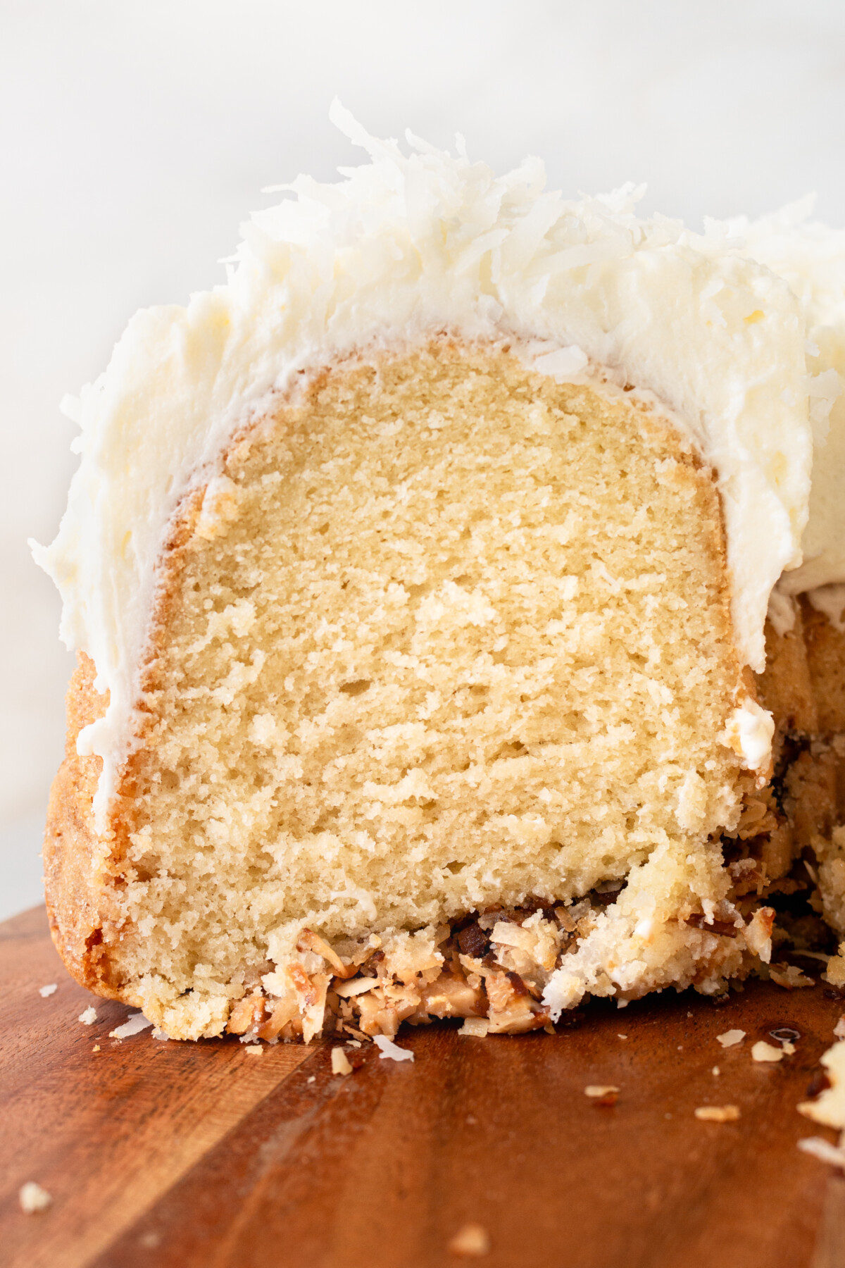 A slice of coconut bundt cake.