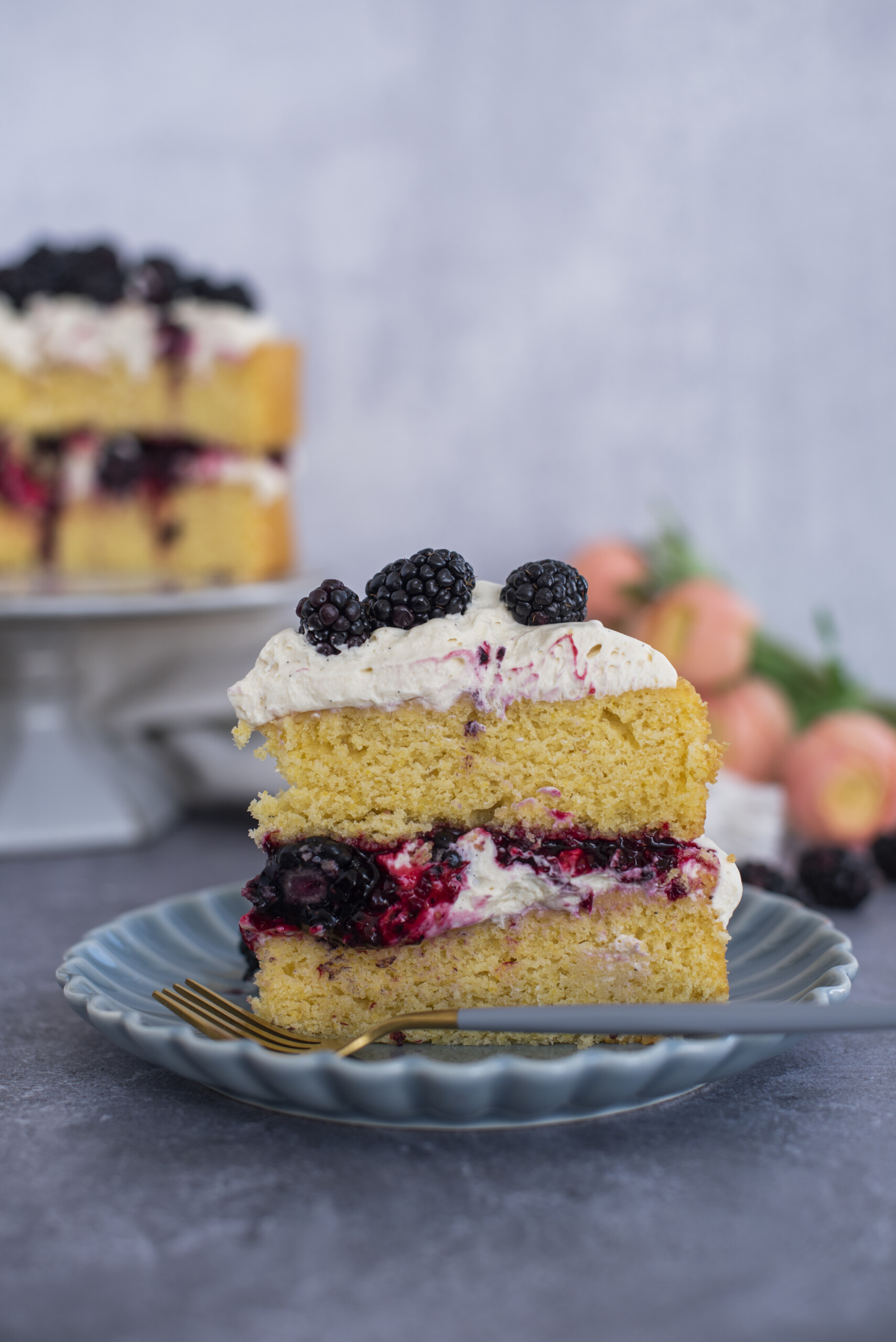 A slice of cake on a blue plate.