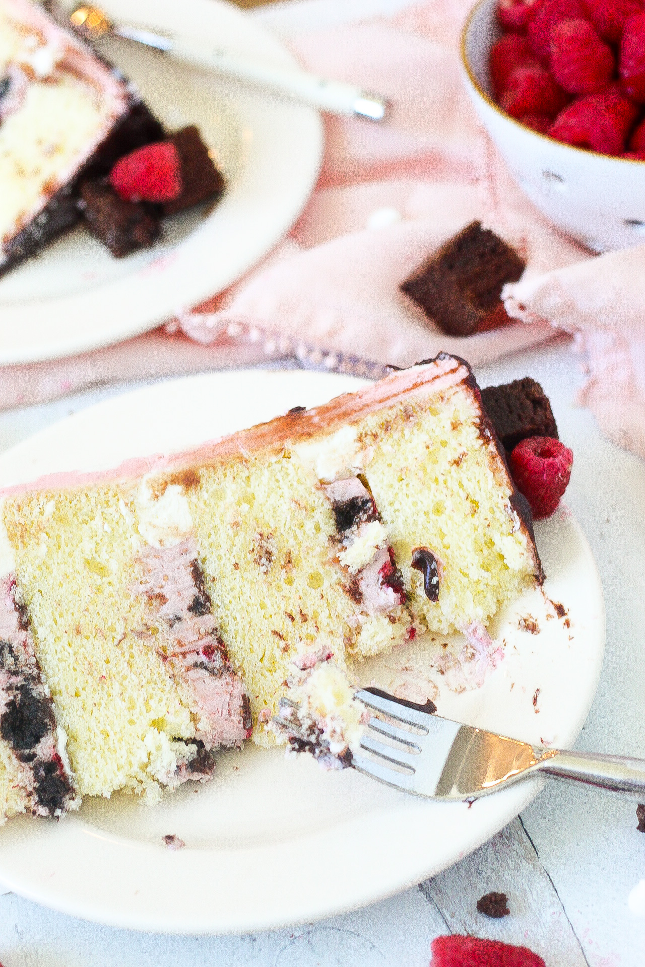 Slice of cake on a plate with fork.