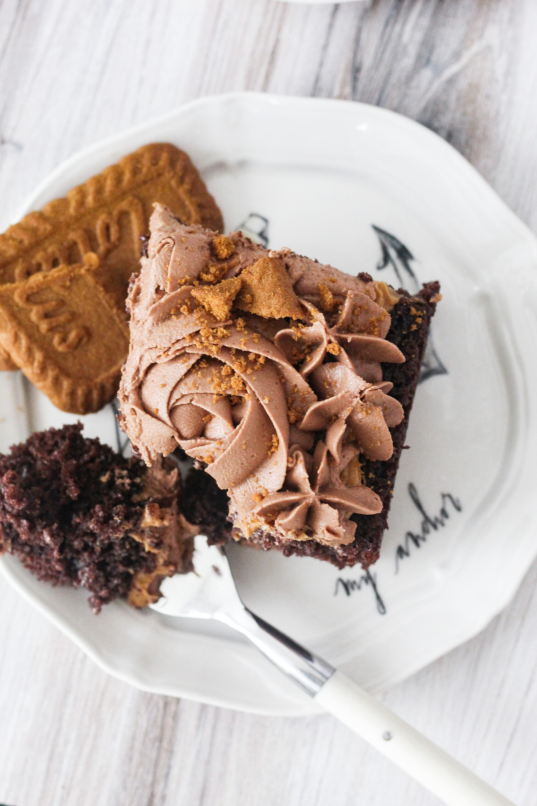 Cake on a plate with a fork.