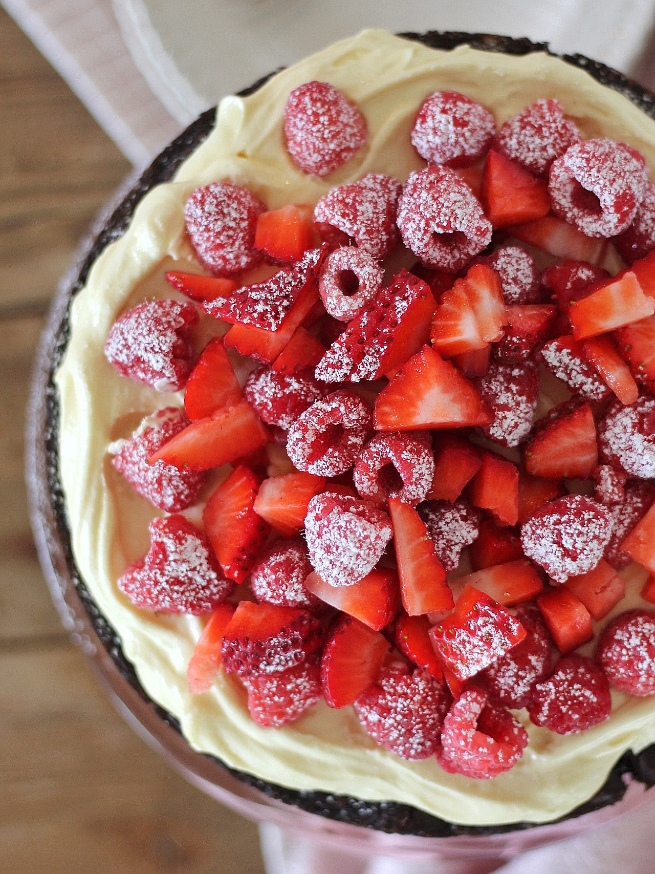 Brownie Berry Torte - decadent brownie layers, topped with a vanilla custard and fresh berries make for the easiest and most delicious, quick-fix dessert. #cakebycourtney #cake #browniecake #brownies #brownieberrytorte #easysbrownierecipe #easydessertrecipe