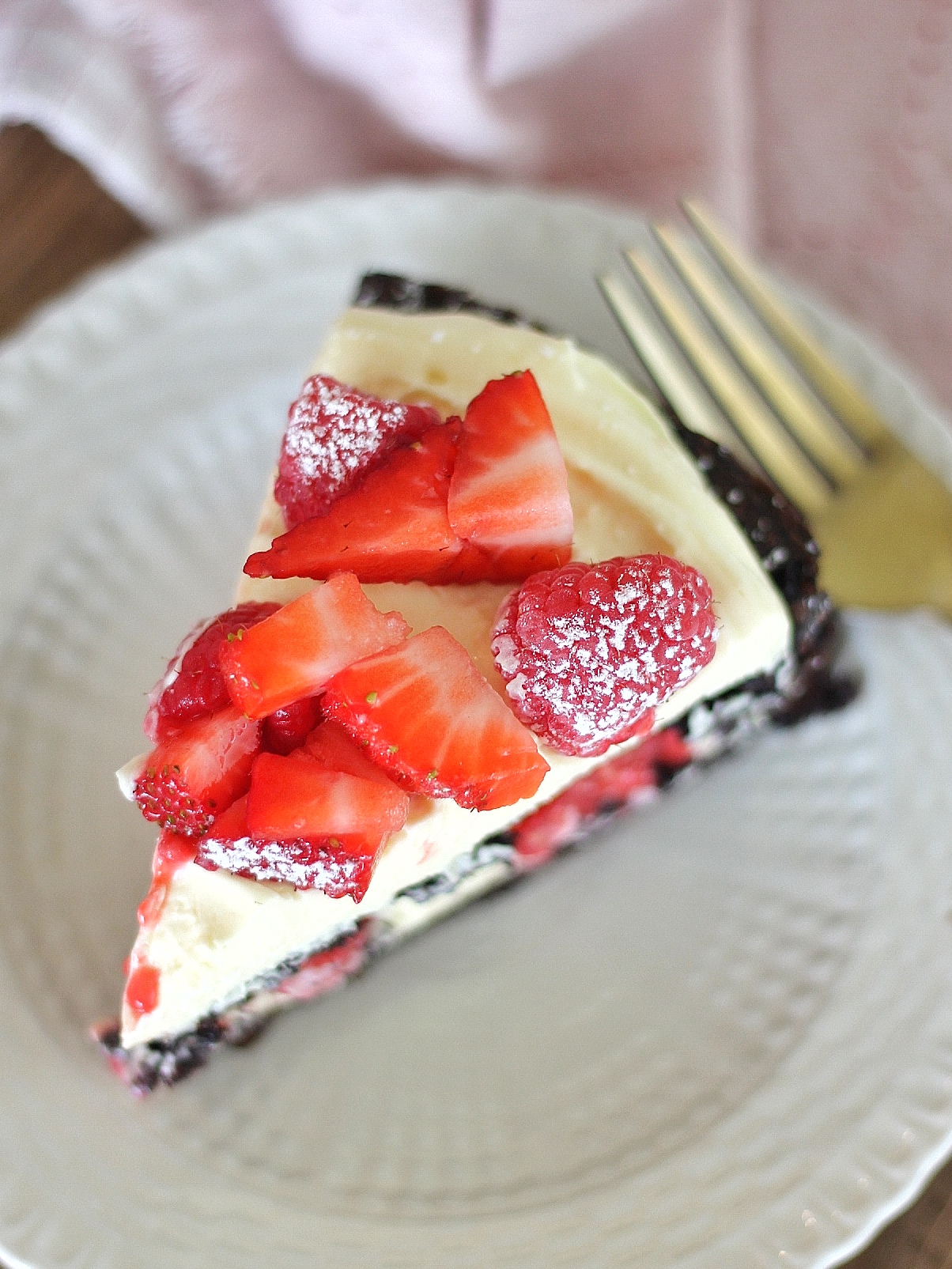 Brownie Berry Torte - decadent brownie layers, topped with a vanilla custard and fresh berries make for the easiest and most delicious, quick-fix dessert. #cakebycourtney #cake #browniecake #brownies #brownieberrytorte #easysbrownierecipe #easydessertrecipe