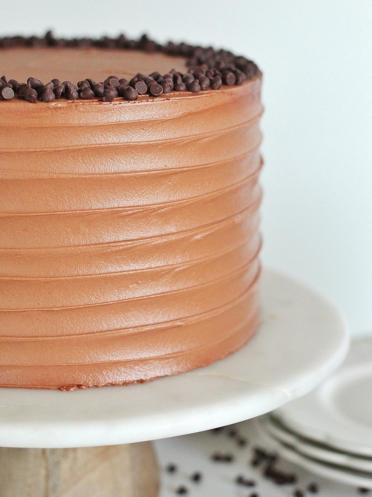 Triple Chocolate Banana Cake: chocolate, chocolate chip banana cake layers with banana cream filling and chocolate buttercream #cakebycourtney #cake #chocolatebananacake #bananacake #bananapudding #chocolatecake #easychocolatecake #moistchocolatecake #bananachocolatecake #bananachocolatebread #banana #chocolate #chocolatebuttercream #magnoliabananapudding