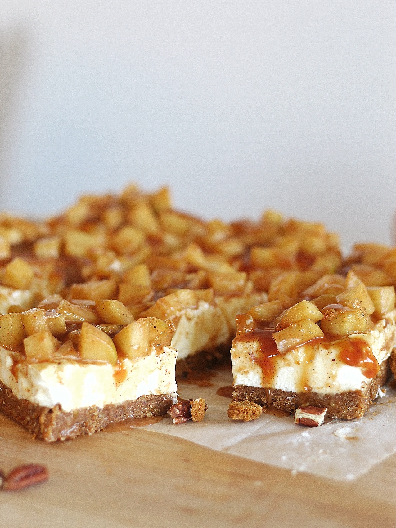Dessert bars on a cutting board.